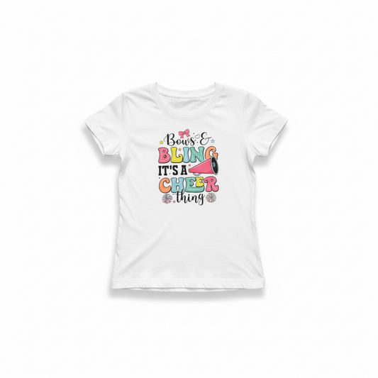 White little girl t-shirt with colorful Bows and Bling It’s a Cheer Thing graphic, boutique cheer shirt for girls