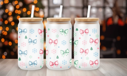 Close-up of holiday bow and snowflake print on Christmas Coquette Glass Cup