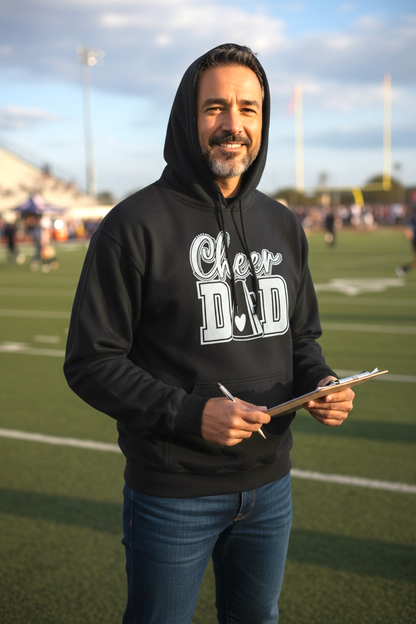 Proud dad wearing Cheer Dad Hoodie on sidelines – show support for your cheerleader