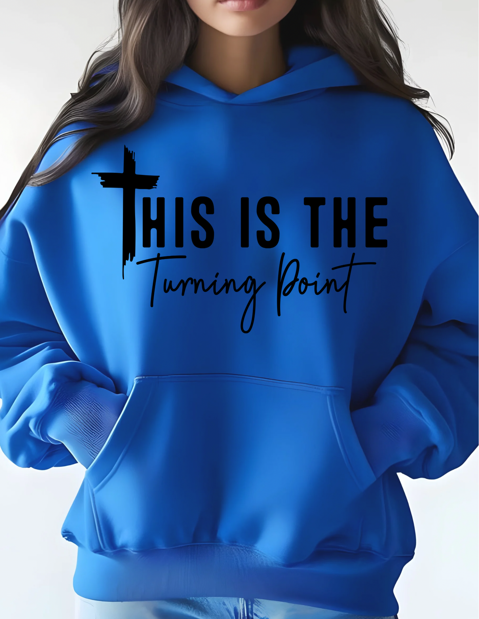 Believer wearing the Turning Point sweatshirt outdoors, expressing gratitude and walking boldly in faith.