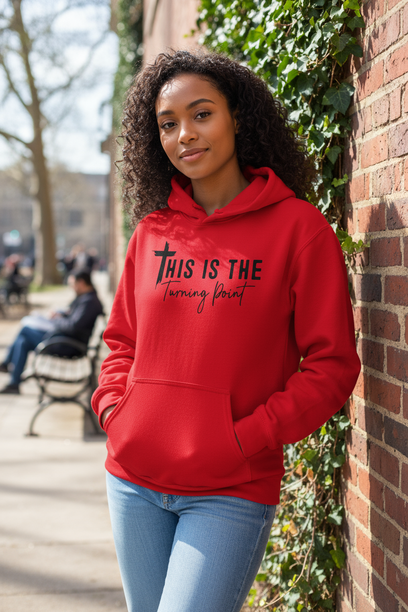 Believer wearing the Turning Point sweatshirt outdoors, expressing gratitude and walking boldly in faith.